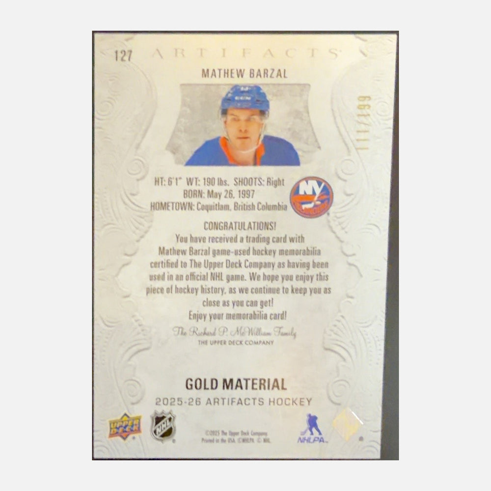 Back of 2025-26 Artifacts Mathew Barzal #127 Gold Material Dual Jersey /199, serial 111/199